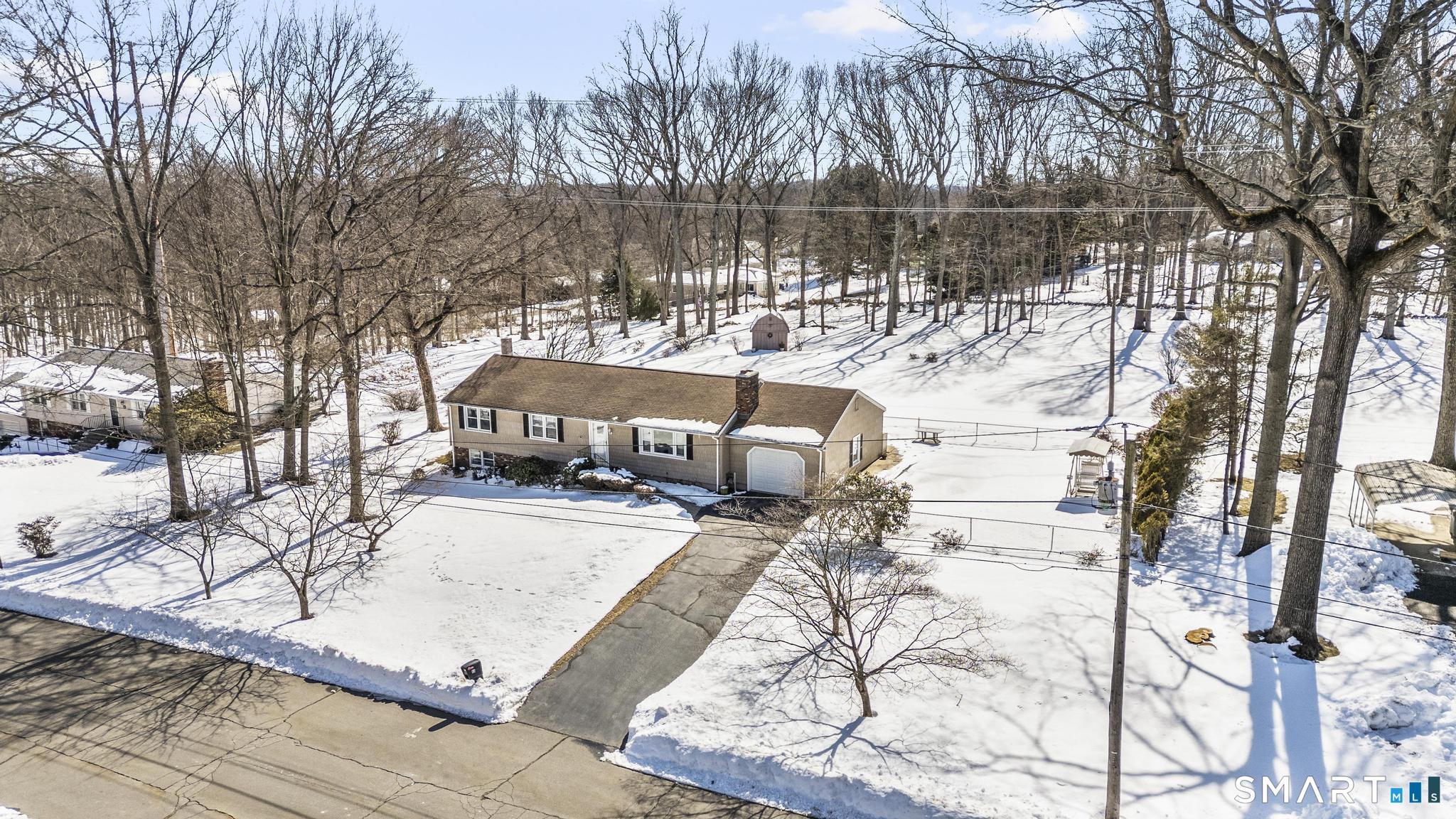 60 Quail Trail Trumbull, CT 06611 - Photo 11 of 37 a view of a yard with sitting area
