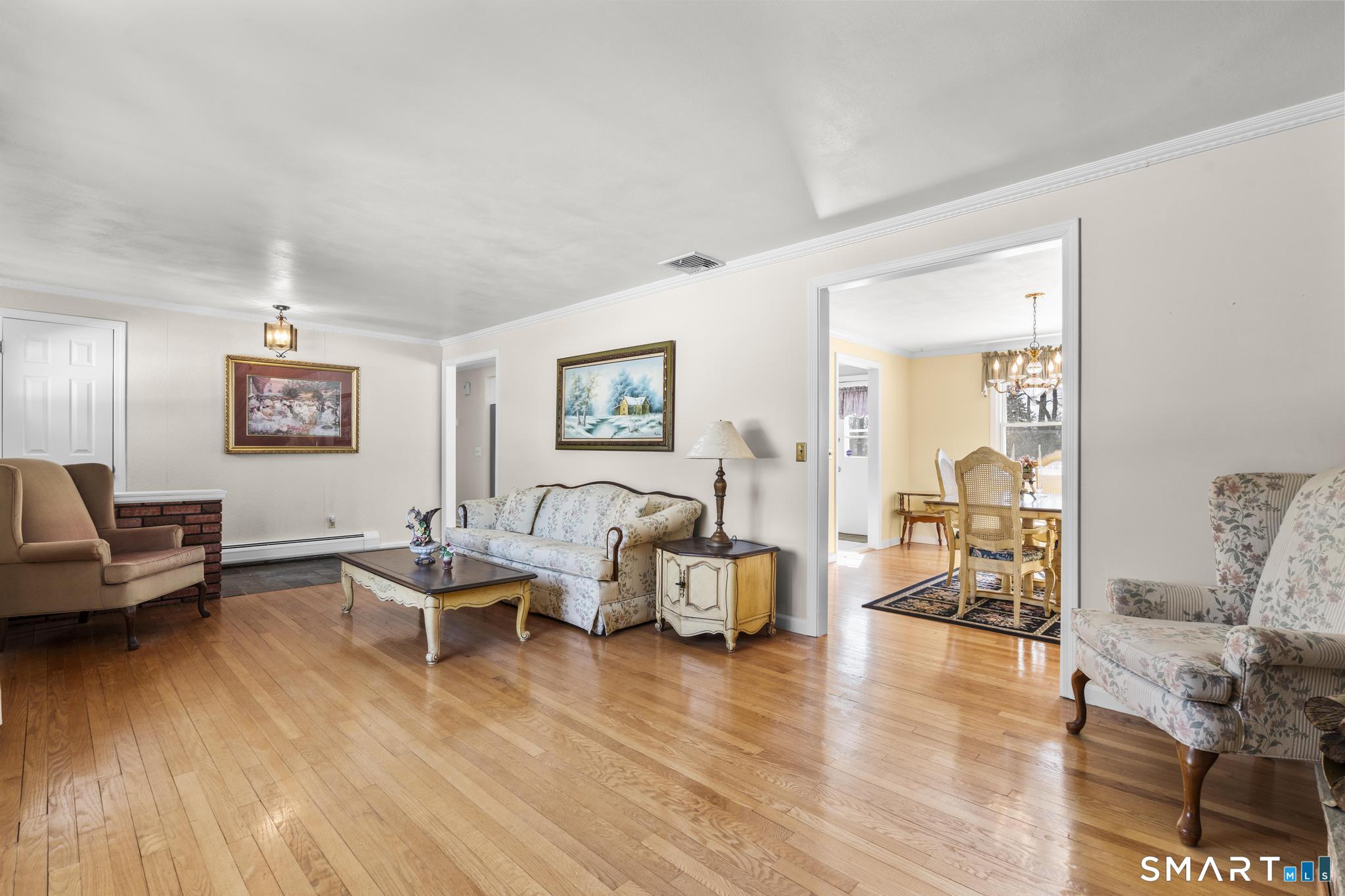 60 Quail Trail Trumbull, CT 06611 - Photo 17 of 37 a living room with furniture and wooden floor