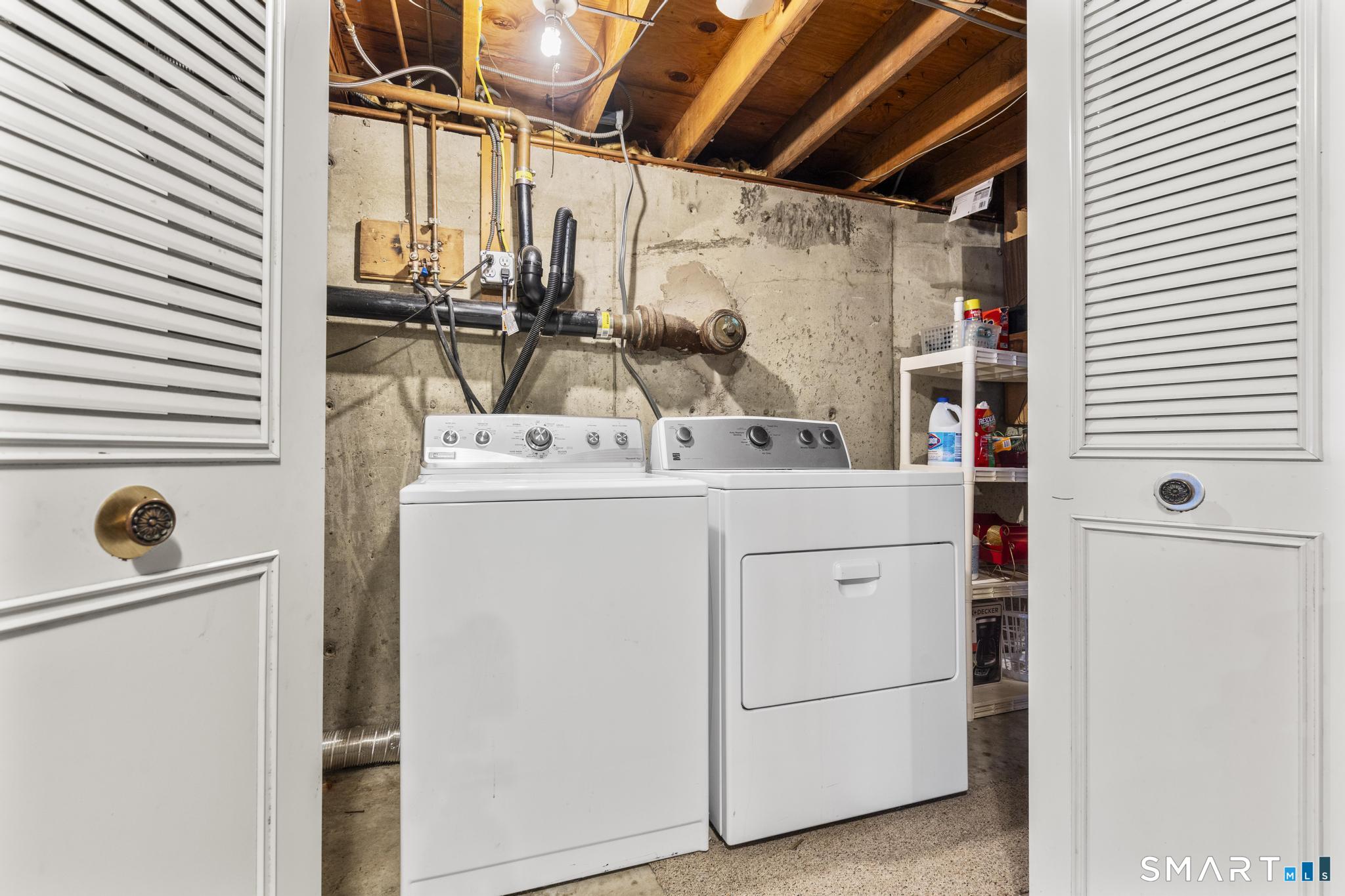 60 Quail Trail Trumbull, CT 06611 - Photo 37 of 37 a utility room with dryer and washer