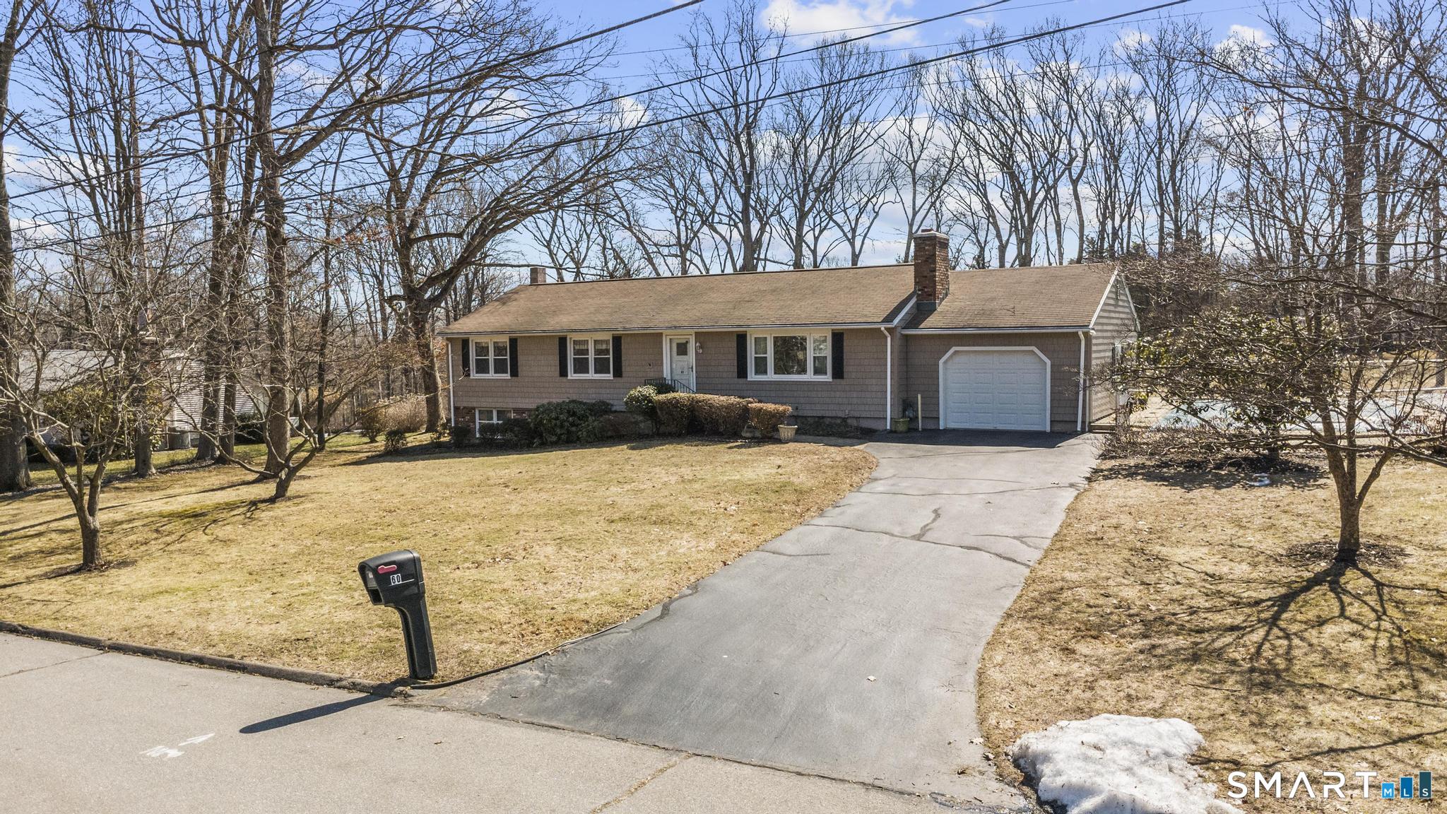 60 Quail Trail Trumbull, CT 06611 - Photo 4 of 37 a view of a yard with a house