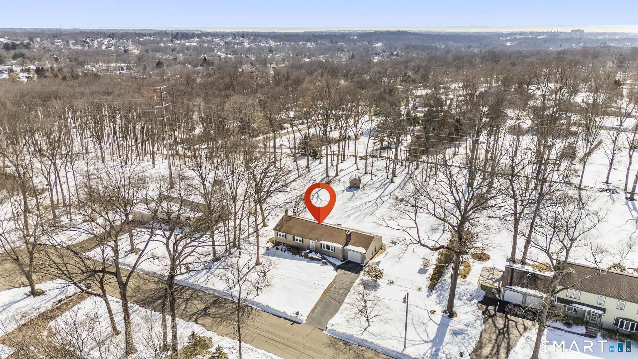 60 Quail Trail Trumbull, CT 06611 - Photo 7 of 37 an aerial view of house with yard and mountain in the background