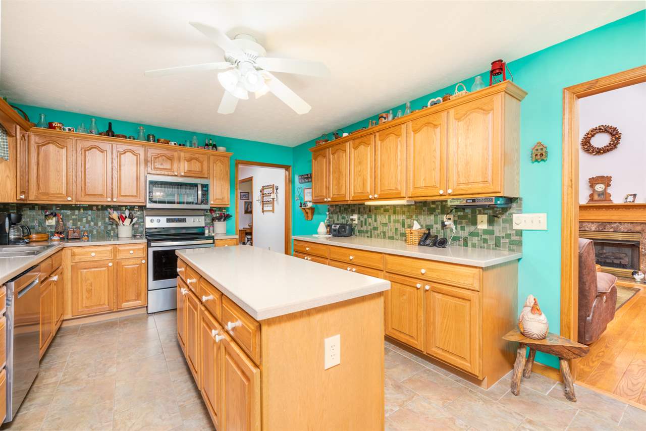 875 Bailey Road Fort Defiance, VA 24437 - Photo 22 of 49 a kitchen with stainless steel appliances granite countertop a stove a sink and a refrigerator