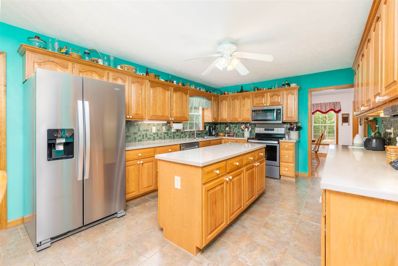 875 Bailey Road Fort Defiance, VA 24437 - Photo 23 of 49 a kitchen with stainless steel appliances granite countertop a stove and a refrigerator