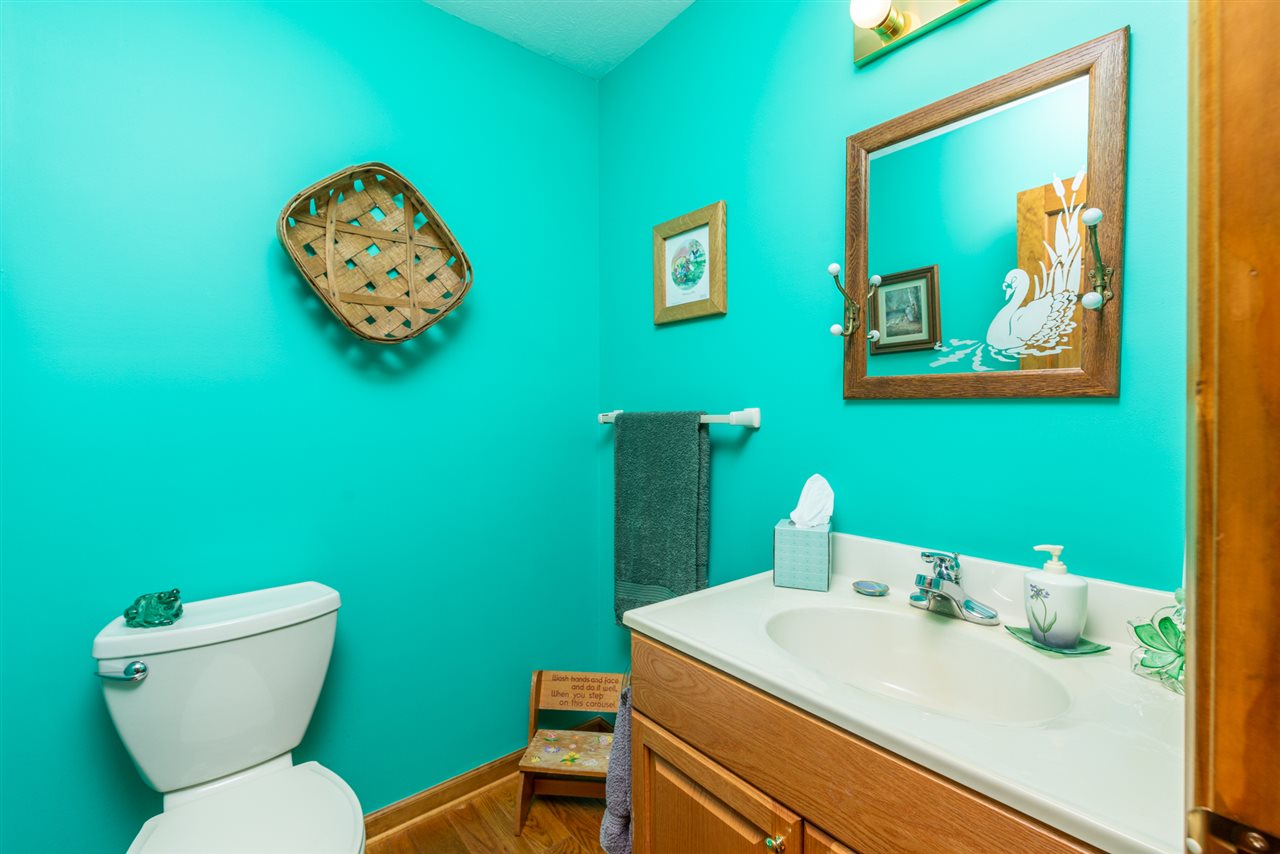 875 Bailey Road Fort Defiance, VA 24437 - Photo 28 of 49 a bathroom with a toilet sink and mirror