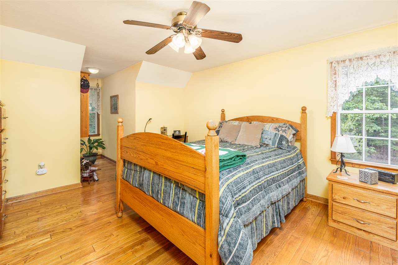 875 Bailey Road Fort Defiance, VA 24437 - Photo 34 of 49 a view of a bedroom with furniture window and a ceiling fan