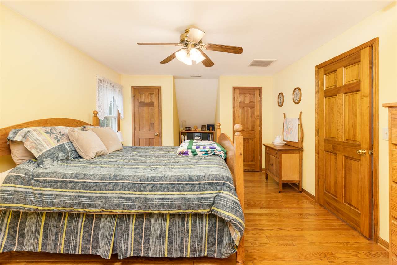 875 Bailey Road Fort Defiance, VA 24437 - Photo 35 of 49 a bedroom with a bed and a large mirror