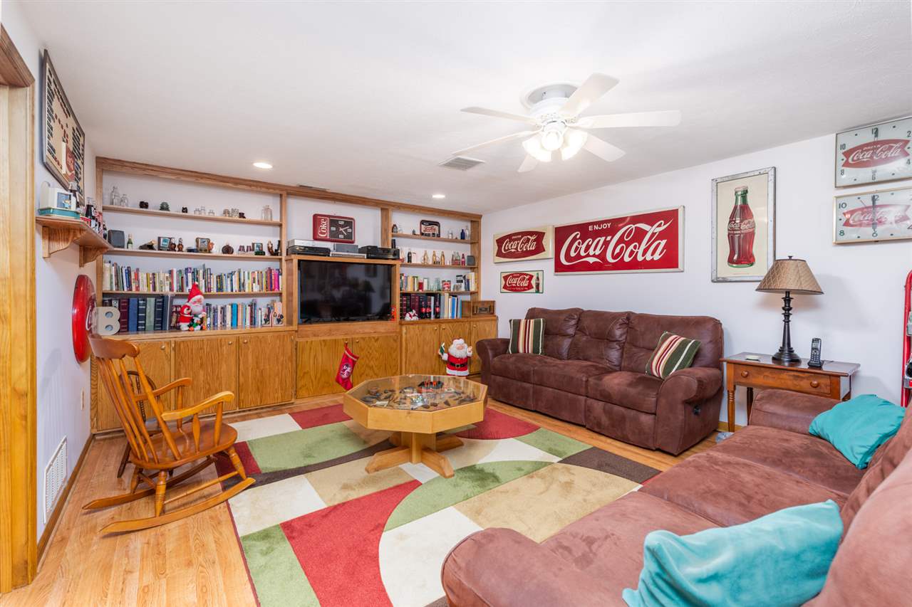 875 Bailey Road Fort Defiance, VA 24437 - Photo 39 of 49 a living room with furniture and a book shelf