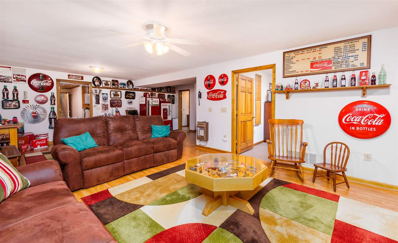 875 Bailey Road Fort Defiance, VA 24437 - Photo 41 of 49 a living room with furniture and a table with wooden floor