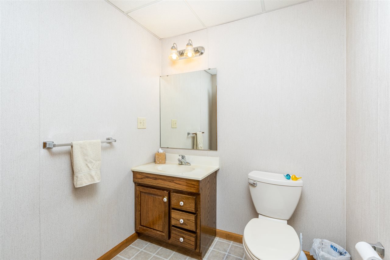875 Bailey Road Fort Defiance, VA 24437 - Photo 43 of 49 a bathroom with a toilet sink and mirror