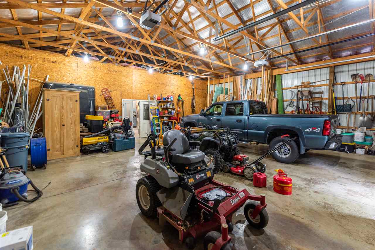 875 Bailey Road Fort Defiance, VA 24437 - Photo 44 of 49 a view of a garage with a bike and a refrigerator