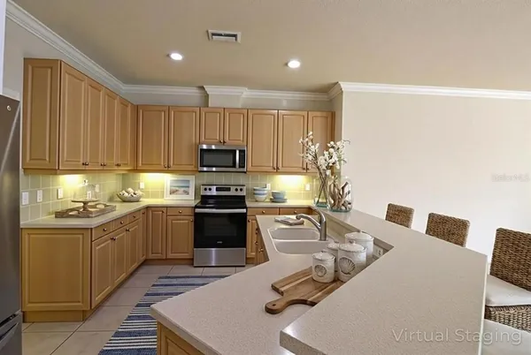 a living room with furniture and flat screen tv