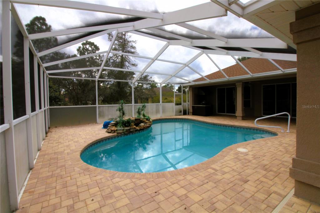8476 Madrid Road Weeki Wachee, FL 34613 - Photo 2 of 59 a view of a indoor swimming pool