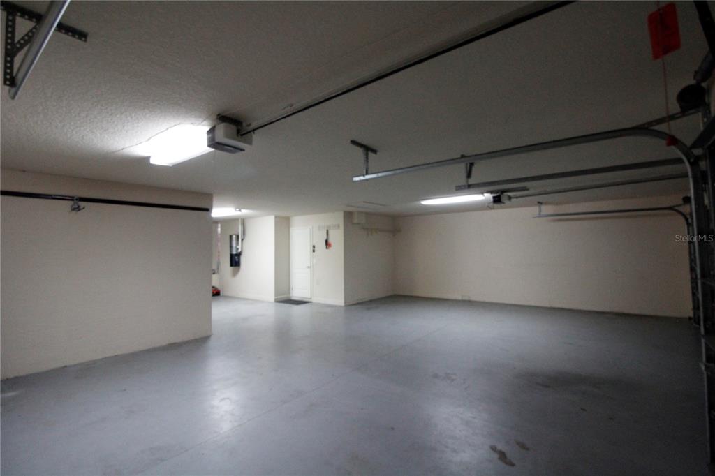 8476 Madrid Road Weeki Wachee, FL 34613 - Photo 36 of 37 a view of a big room with closet and windows