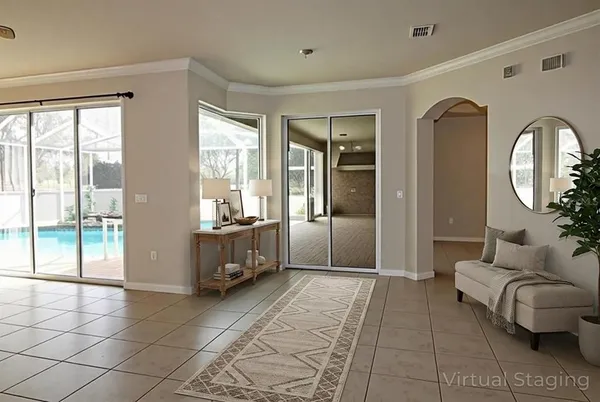 an empty room with wooden floor closet and windows