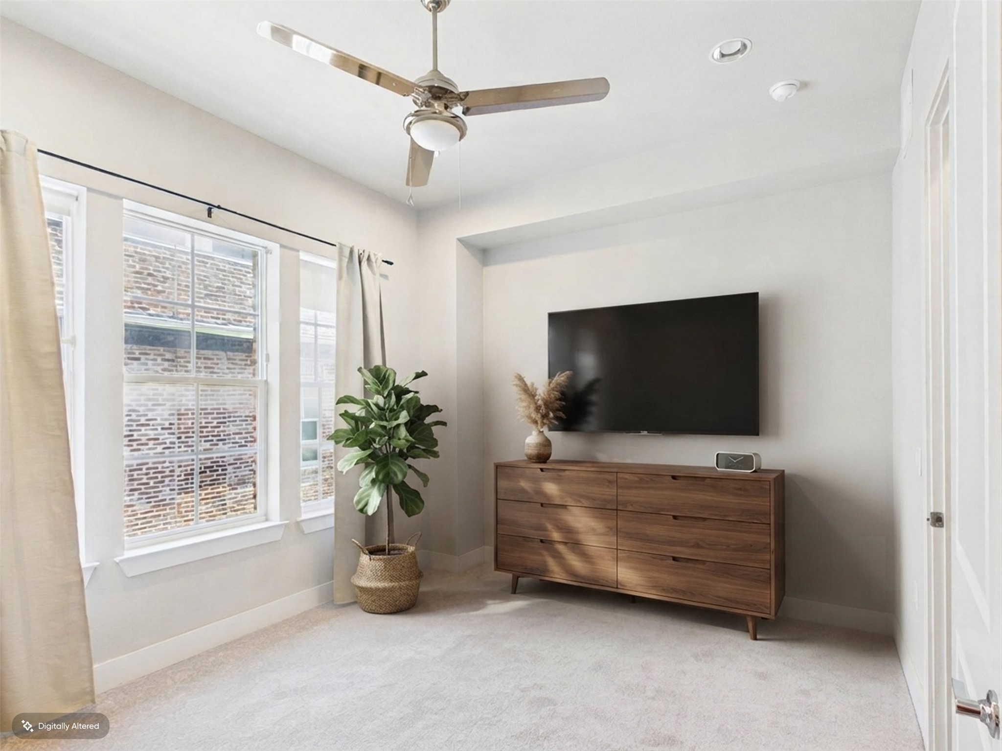 1308 Tinnin Ford Road, Unit 14 Austin, TX 78741 - Photo 21 of 40 Plush carpeting and high ceilings define this inviting bedroom space.