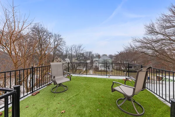 a view of a chair and table in the yard