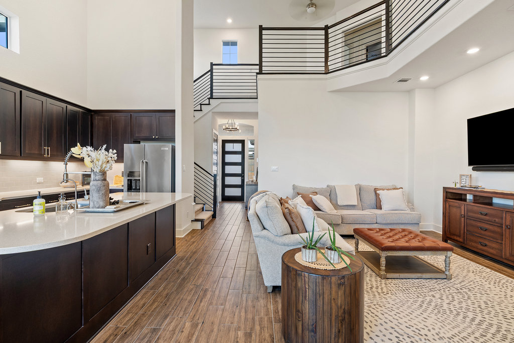 427 Cartwheel Bend, Unit 92 Austin, TX 78738 - Photo 16 of 40 a kitchen with a refrigerator and a stove