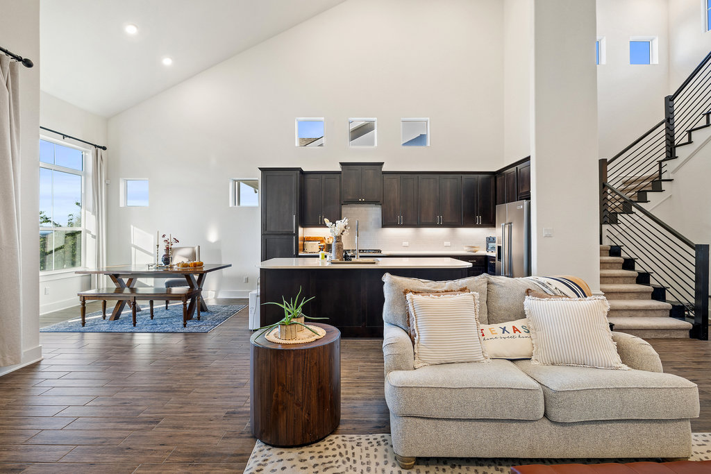 427 Cartwheel Bend, Unit 92 Austin, TX 78738 - Photo 27 of 40 a living room with furniture and wooden floor