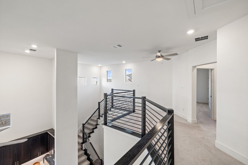 427 Cartwheel Bend, Unit 92 Austin, TX 78738 - Photo 33 of 40 a view of an entryway with wooden floor