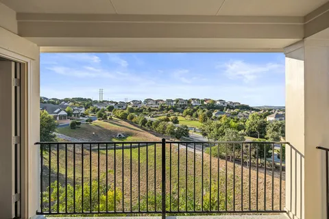 a view of city from a balcony
