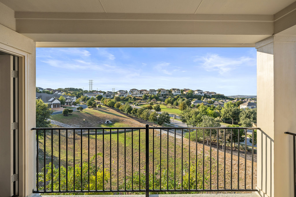 427 Cartwheel Bend, Unit 92 Austin, TX 78738 - Photo 37 of 40 a view of city from a balcony