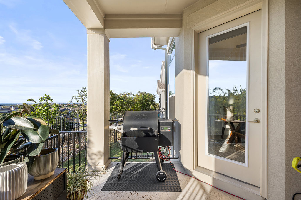 427 Cartwheel Bend, Unit 92 Austin, TX 78738 - Photo 39 of 40 a view of balcony with furniture