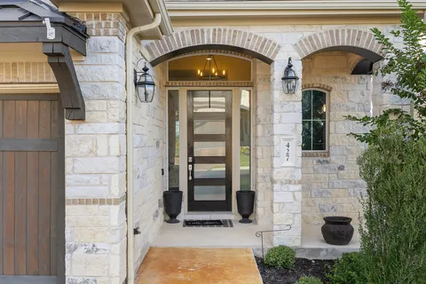 a front view of a house with a balcony