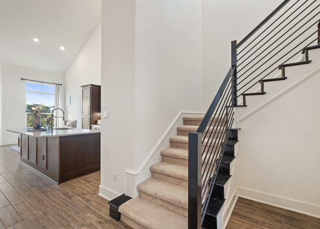427 Cartwheel Bend, Unit 92 Austin, TX 78738 - Photo 7 of 40 a view of entryway and hall with wooden floor
