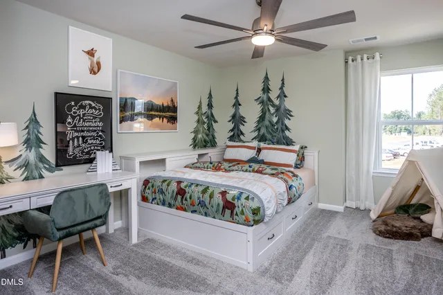 a bedroom with a bed and a mirror