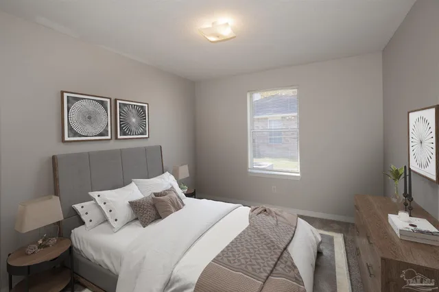 an empty room with windows and outdoor view