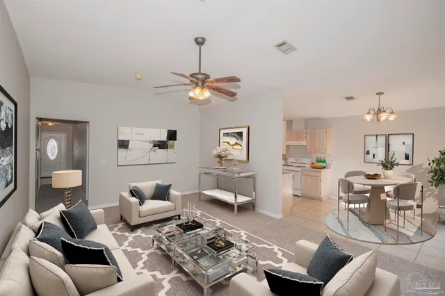 a view of an empty room with a fan