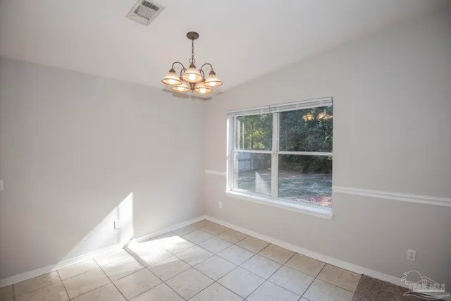 a view of walk in closet with window