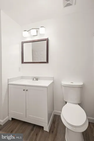 a bathroom with a toilet a sink and a bathtub