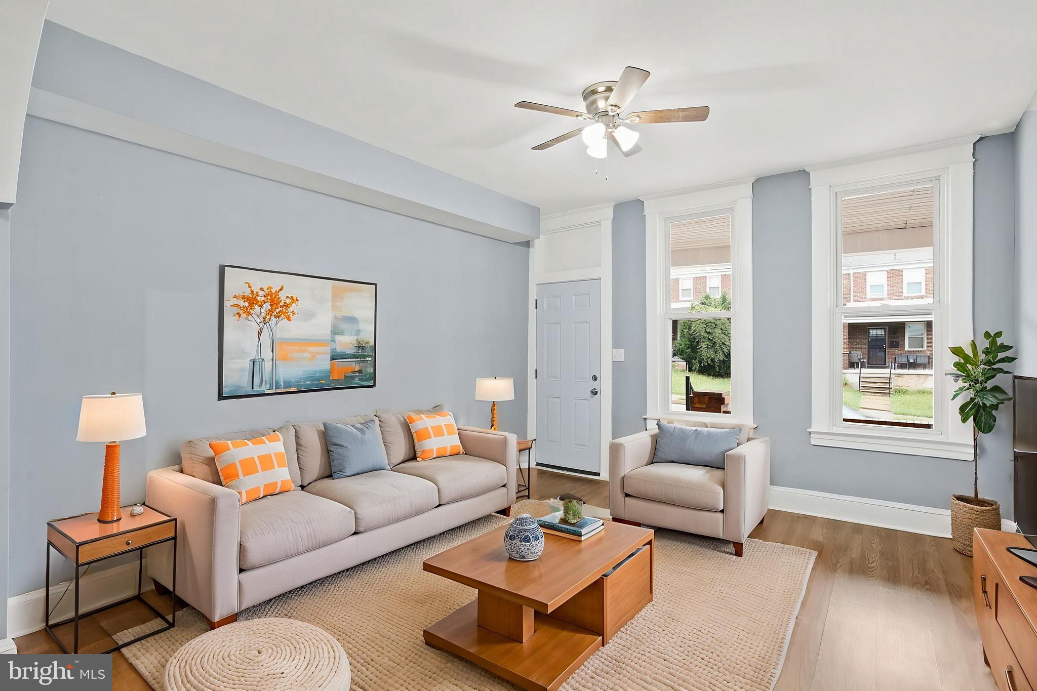 2811 Erdman Avenue Baltimore, MD 21213 - Photo 4 of 17 a living room with furniture and a large window