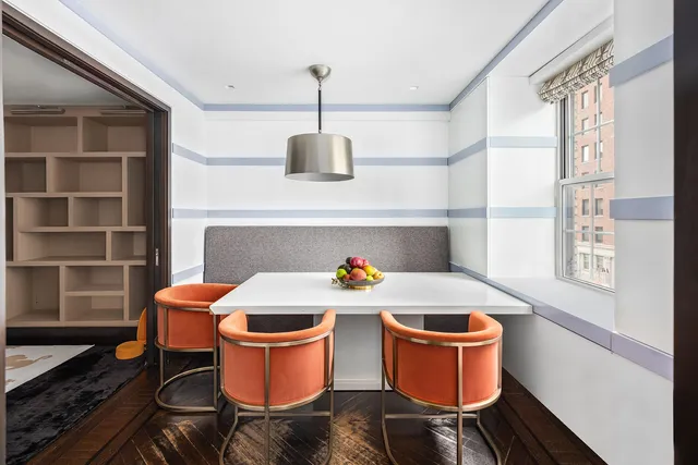 a room with furniture and a window