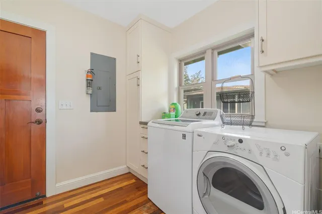 a view of livingroom with washer and dryer