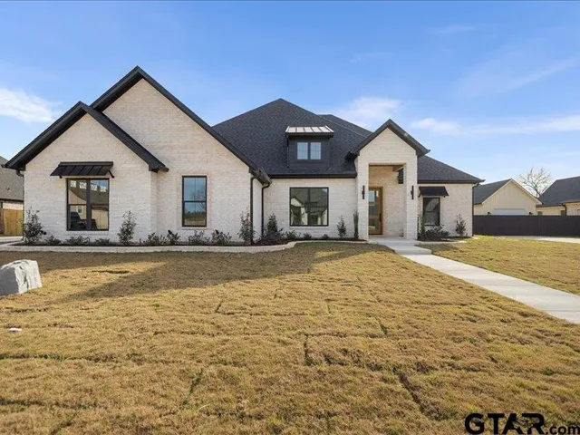a view of pool with outdoor seating
