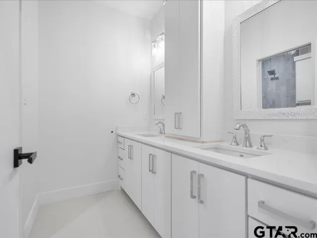 a bathroom with a toilet and a sink