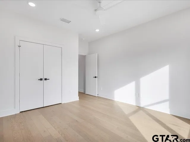 a view of a hall with the door