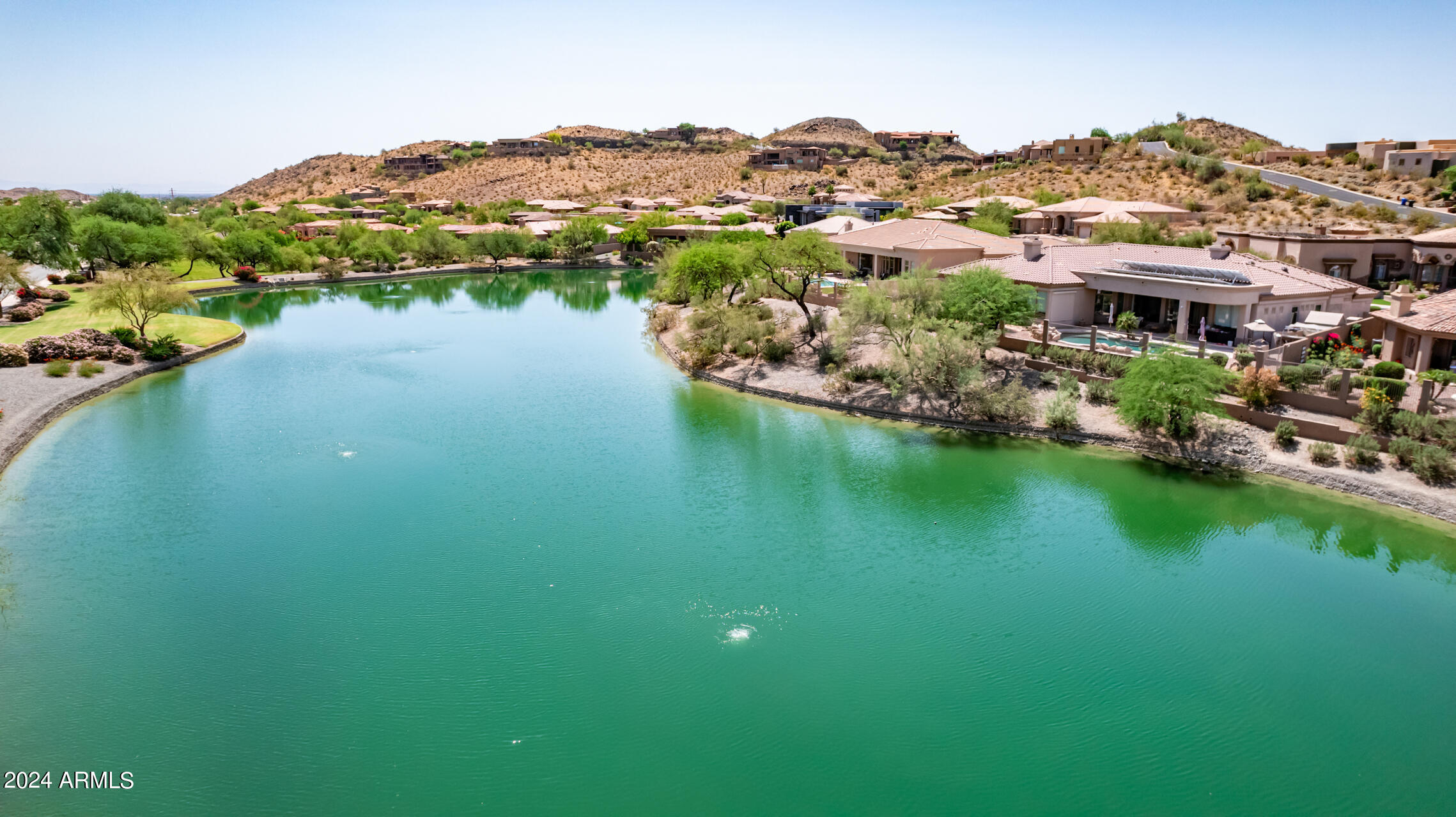 2115 East Barkwood Road, Unit 23 Phoenix, AZ 85048 - Photo 15 of 15 an aerial view of residential houses with outdoor space and river