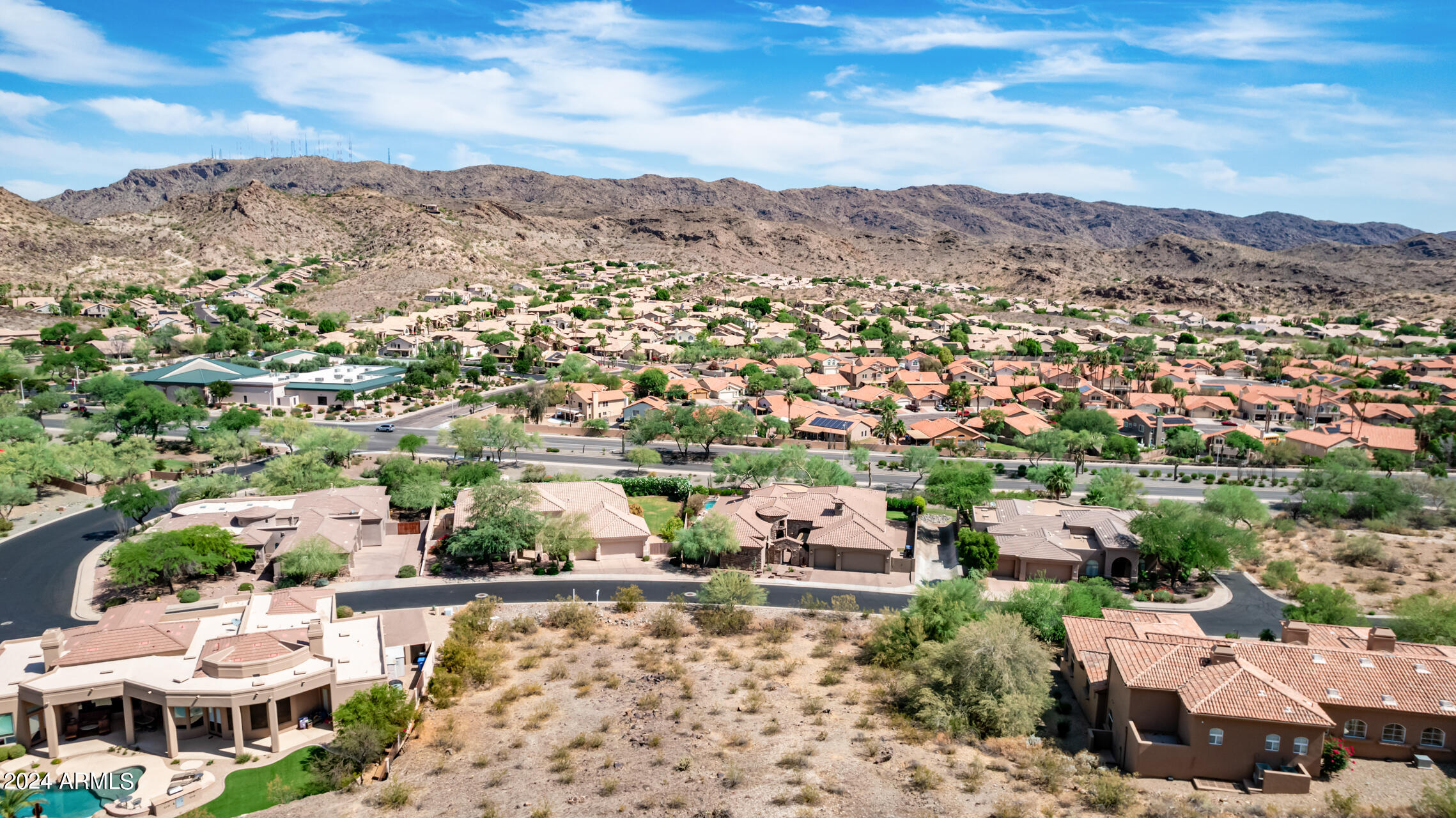 2115 East Barkwood Road, Unit 23 Phoenix, AZ 85048 - Photo 4 of 15 an aerial view of residential houses with outdoor space