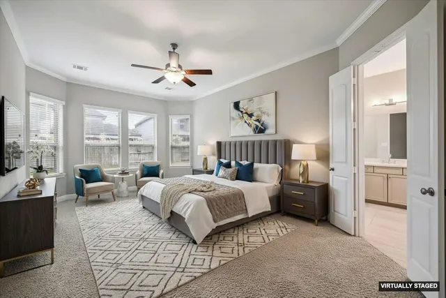 a bed room with bed and a large window