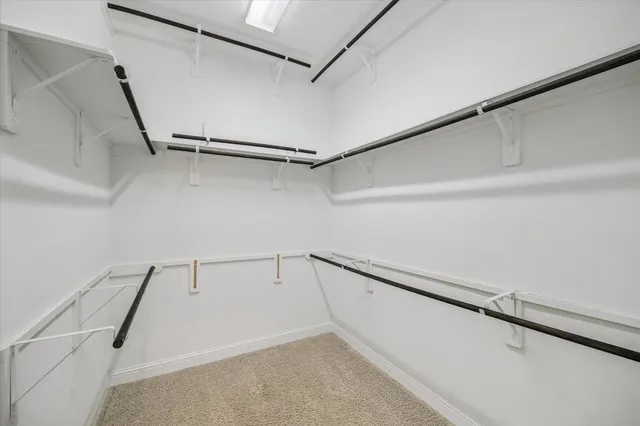 a view of a room with racks on the wall