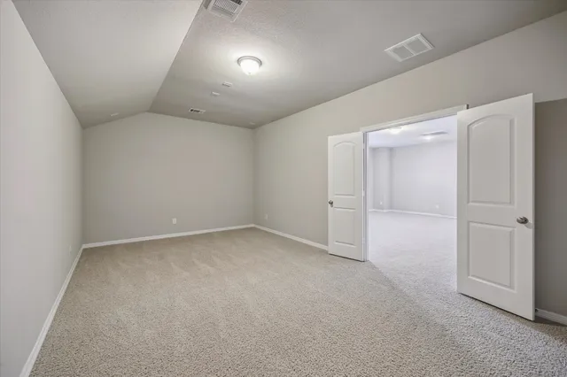 an empty room with a natural light