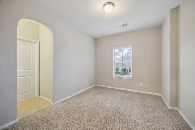 an empty room with windows