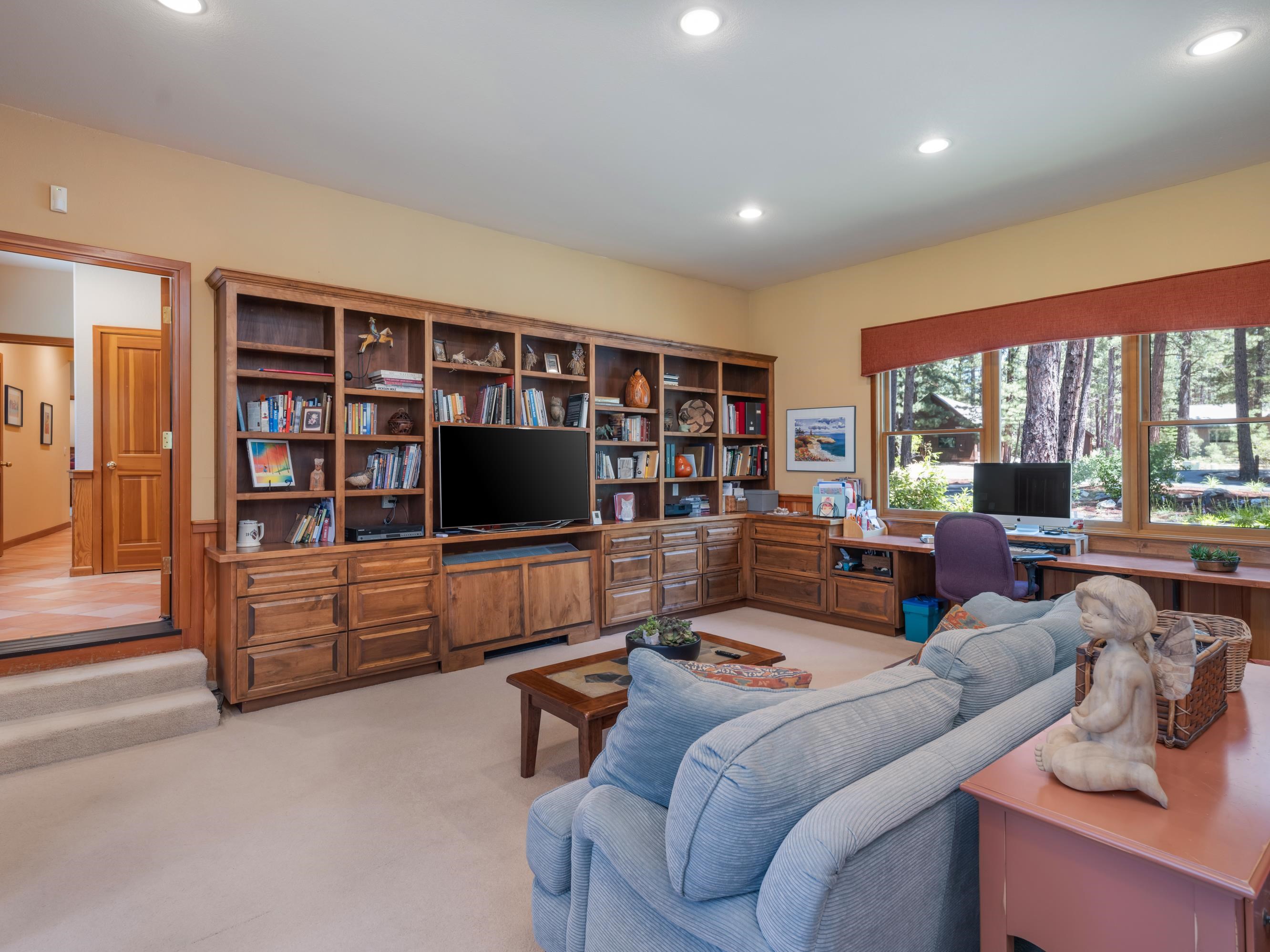 134 Quail View Circle Clio, CA 96106 - Photo 27 of 49 a living room with furniture and a flat screen tv