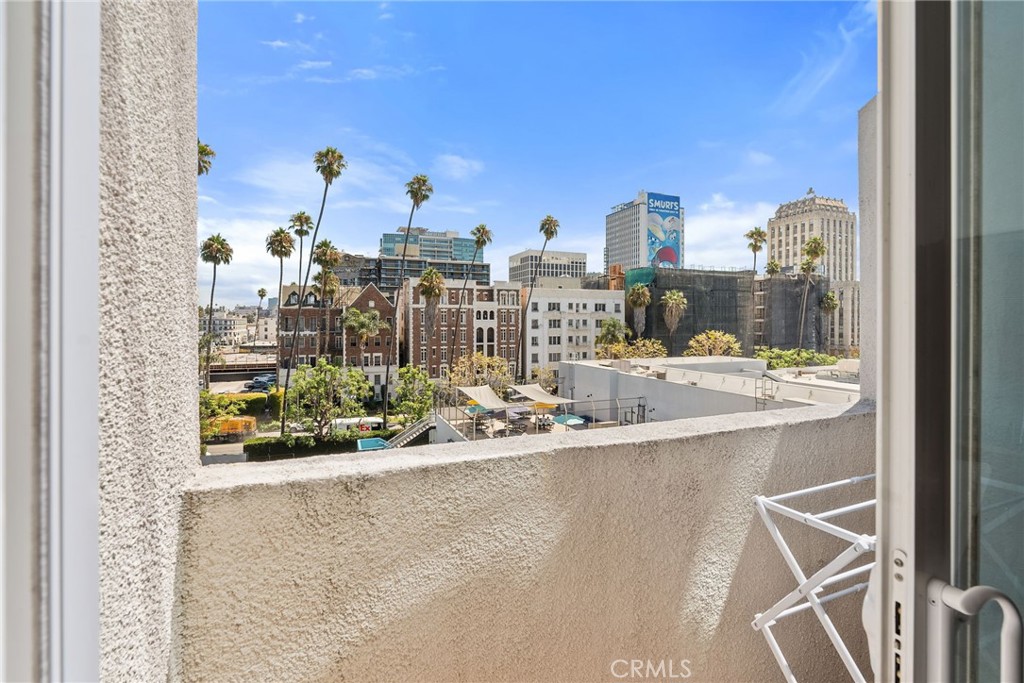 620 South Gramercy Place, Unit 412 Los Angeles, CA 90010 - Photo 12 of 41 a view of a balcony with city view
