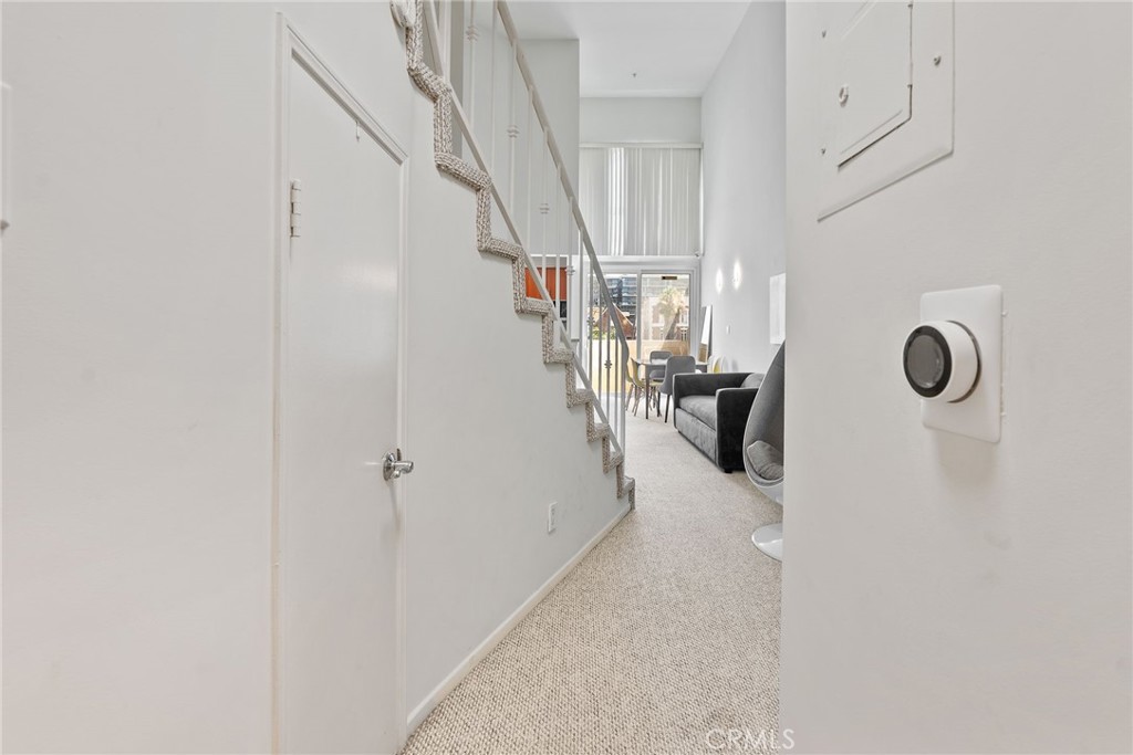 620 South Gramercy Place, Unit 412 Los Angeles, CA 90010 - Photo 15 of 41 a view of hallway with washer and dryer