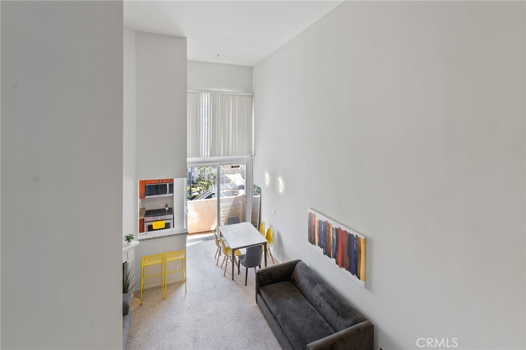 620 South Gramercy Place, Unit 412 Los Angeles, CA 90010 - Photo 17 of 41 a living room with furniture
