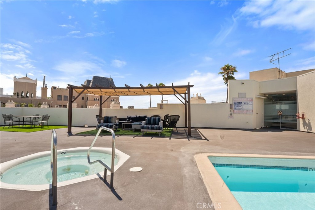 620 South Gramercy Place, Unit 412 Los Angeles, CA 90010 - Photo 25 of 41 a view of a swimming pool